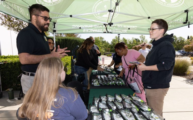 The OVSRS answers questions about victims' rights at an event in 2025.