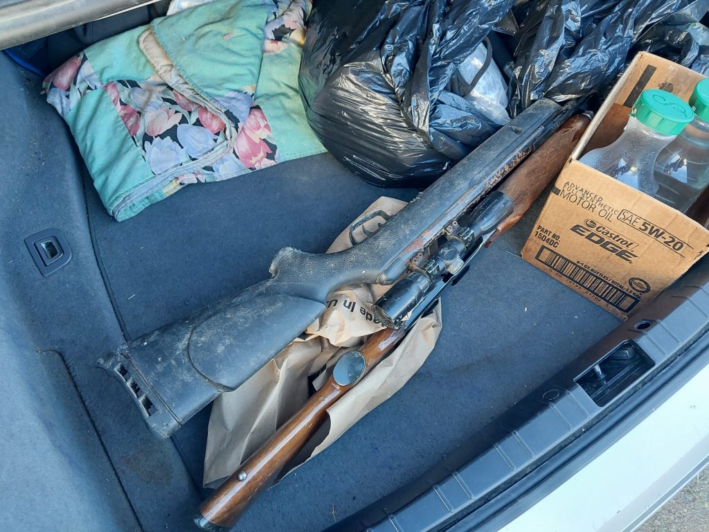 Significant contraband seized included a rifle and simulated rifle and security badges.