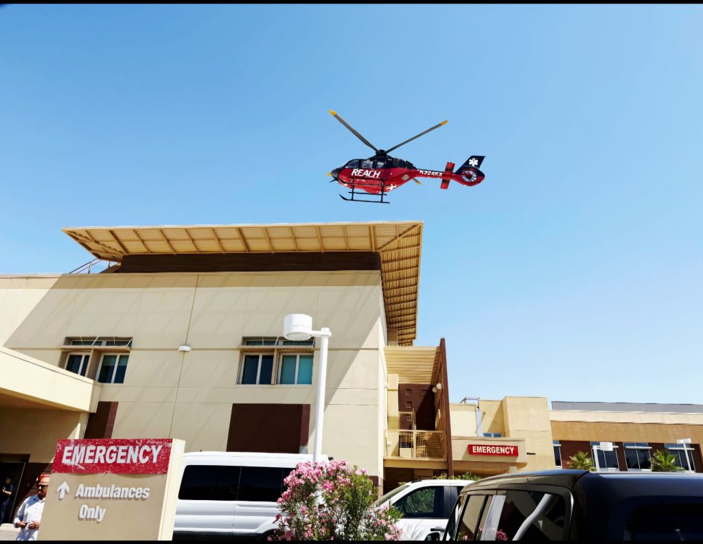 A helicopter prepares to land.