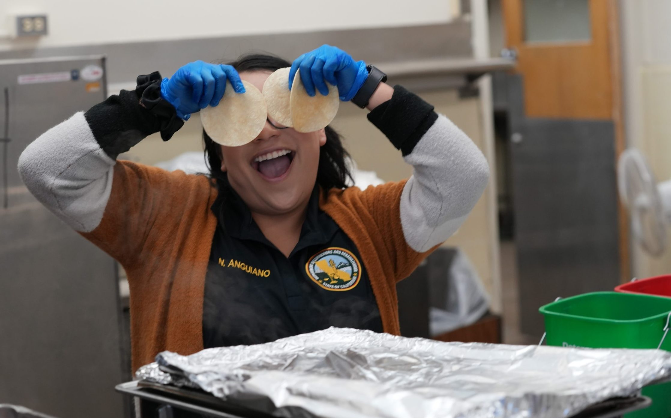 A staff member goofs around for the camera at CCI-Tehachapi for a Cinco de Mayo employee appreciation celebration.