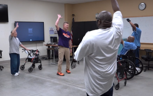 Coach Chapin at California Health Care Facility in Stockton, or CHCF, teaches a physical education class to incarcerated people.