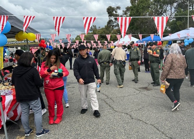 CMF carnival event with staff members walking around. 
