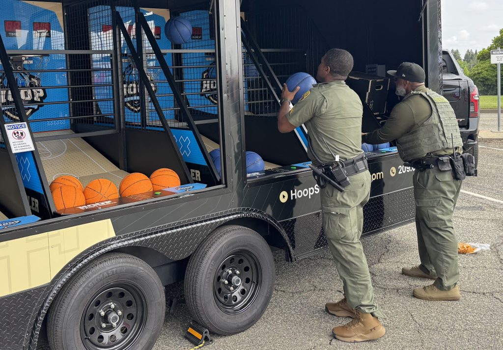 Correctional officers shoot hoops at CMF.