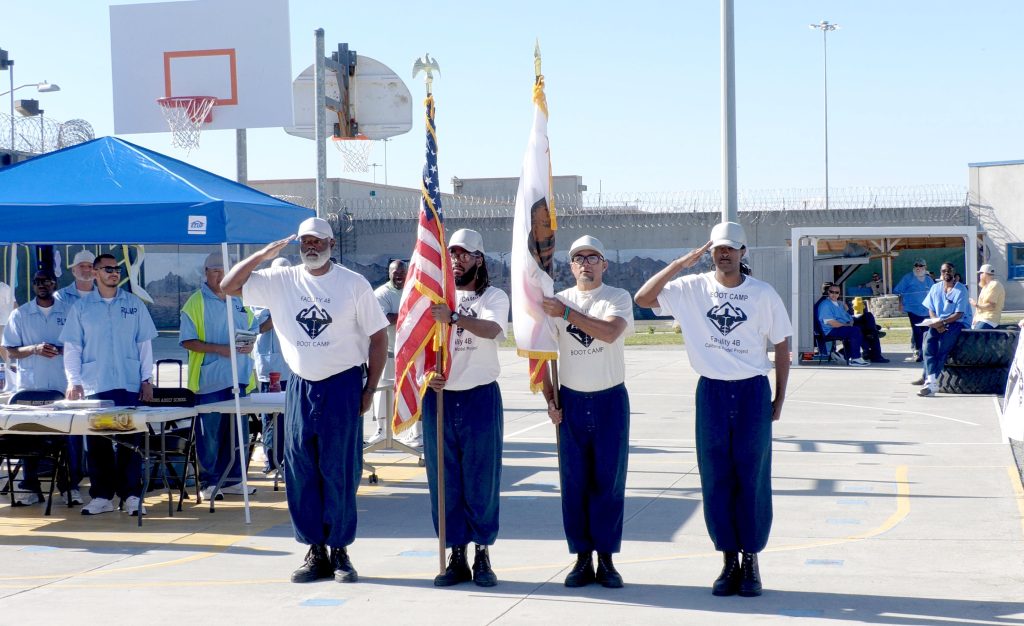 Incarcerated color guard presents colors to open the Cancer Walk at CSP-Corcoran. 