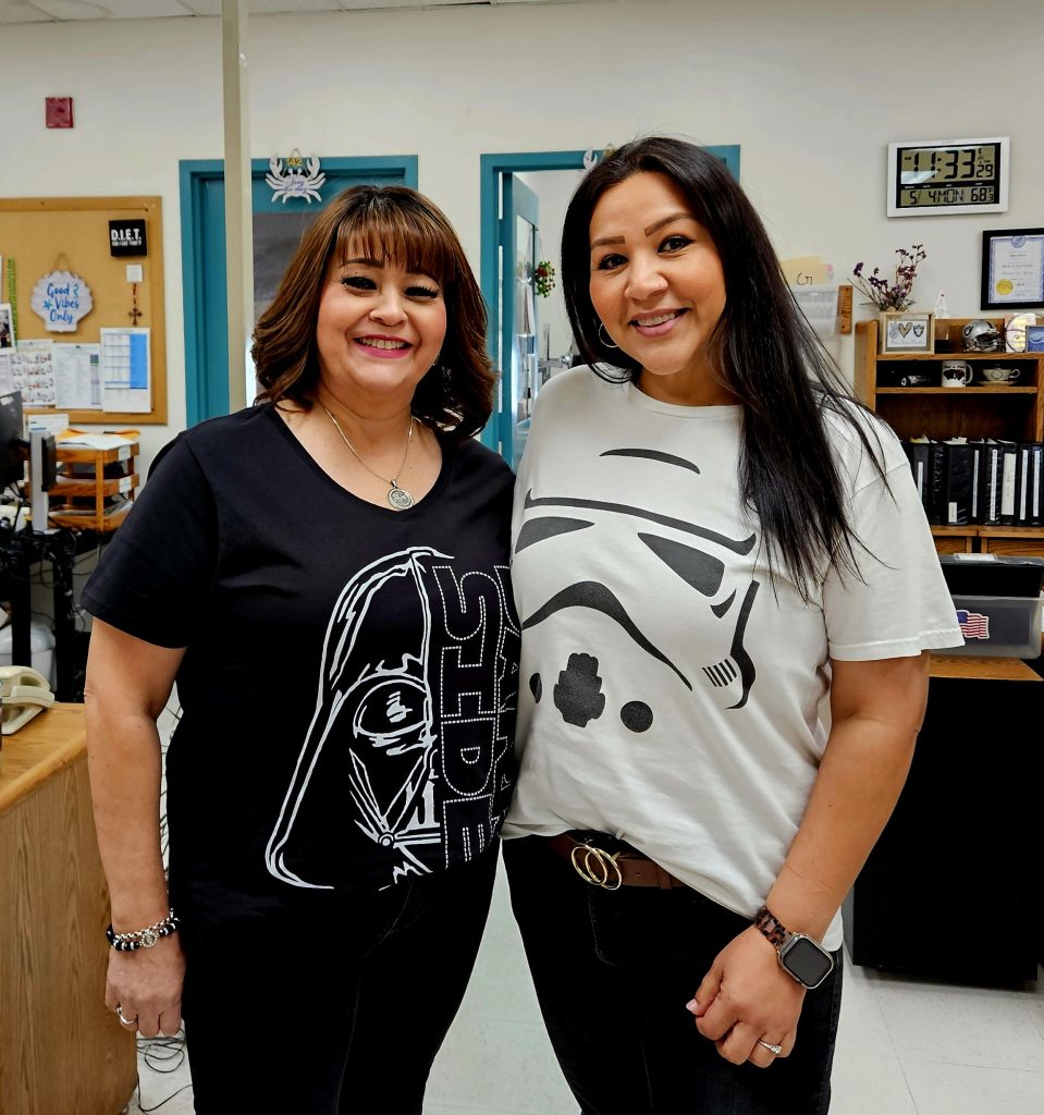 Two women wearing Star Wars shirts for Star Wars Day, May 6, 2026, Centinela State Prison.