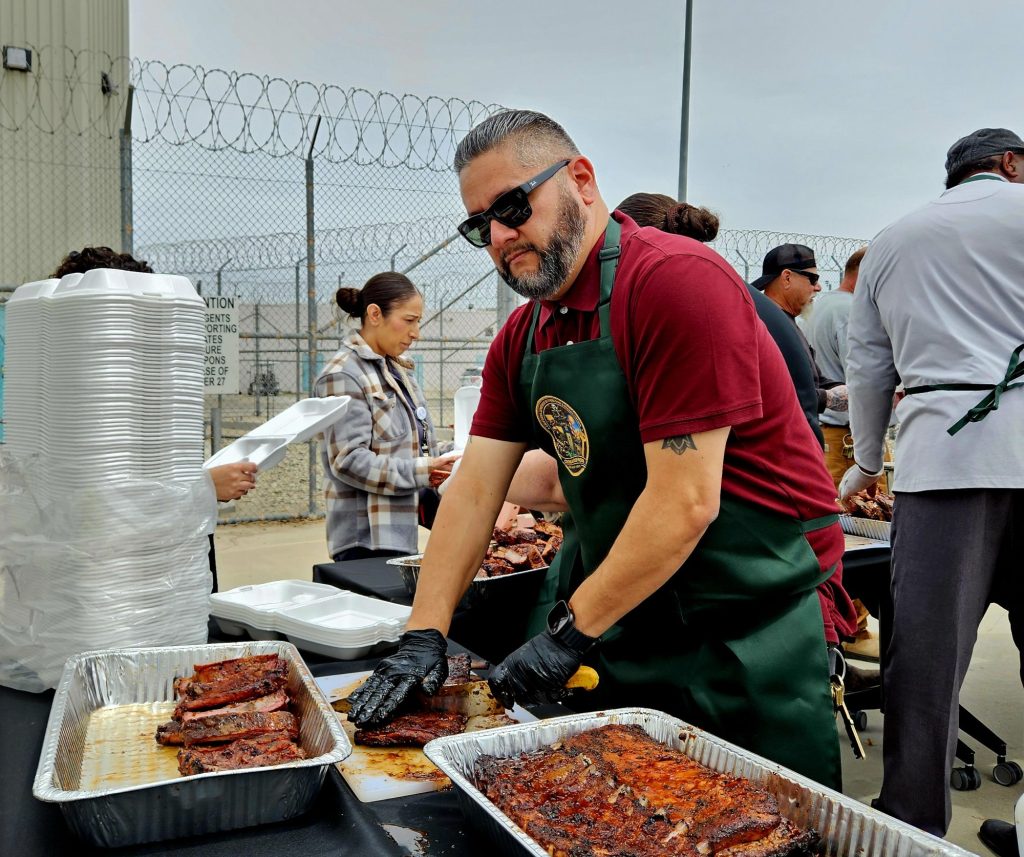 Serving food at Centinela State Prison.