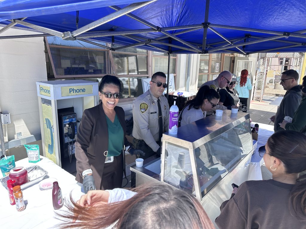 Managers serve donated ice cream to staff at the Correctional Training Facility at Soledad, California, in May 2026.