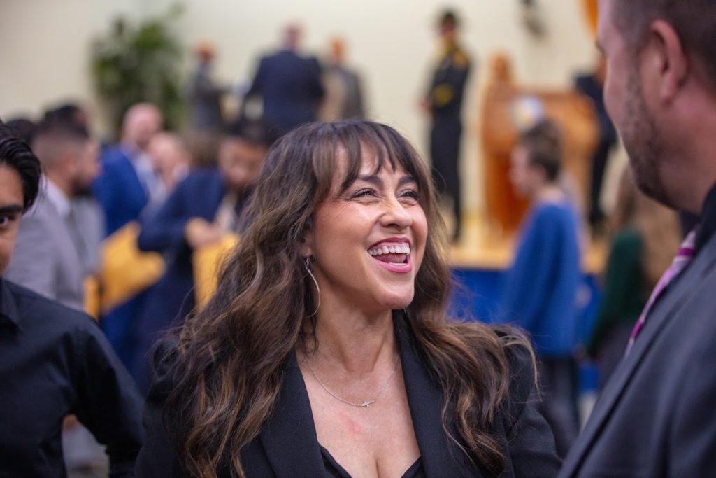 Smiling parole agent at the academy.
