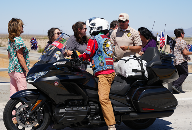 ISP staff and motorcyclist