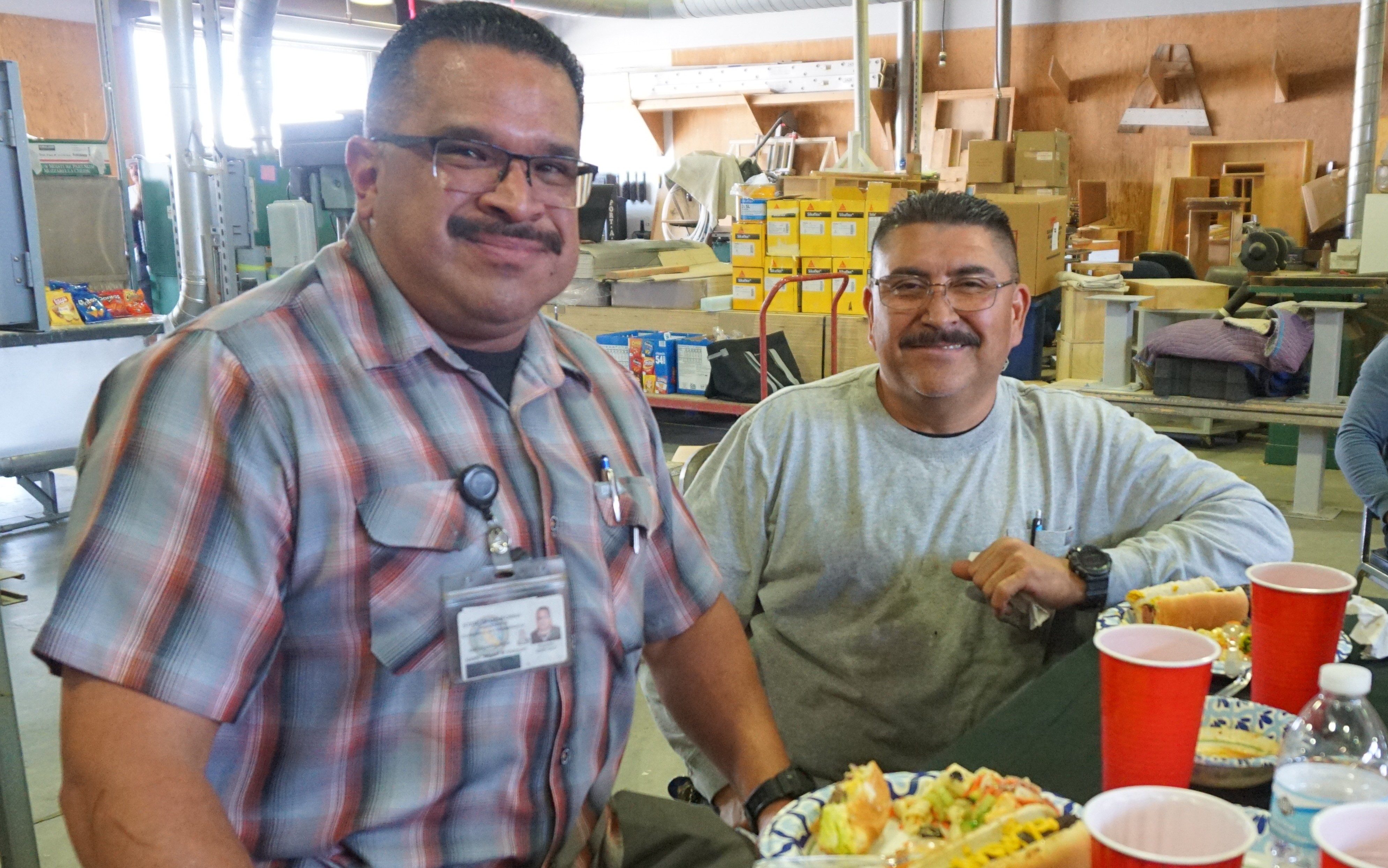 Two maintenance mechanics enjoy the lunch during National Skilled Trades Day 2026.