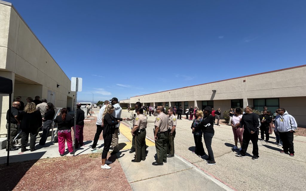A line of staff members wait to get their tacos for a staff appreciation event at CSP-Los Angeles County.