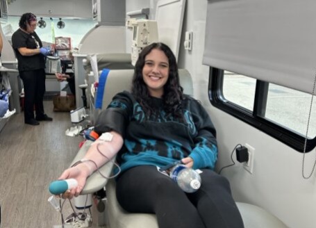 Female staff member donates blood at Mule Creek State Prison.