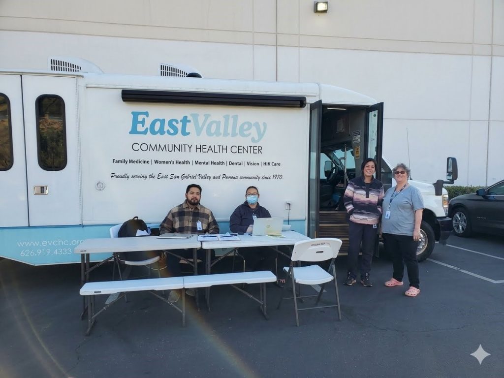 Staff in front of East Valley Community Health Center van