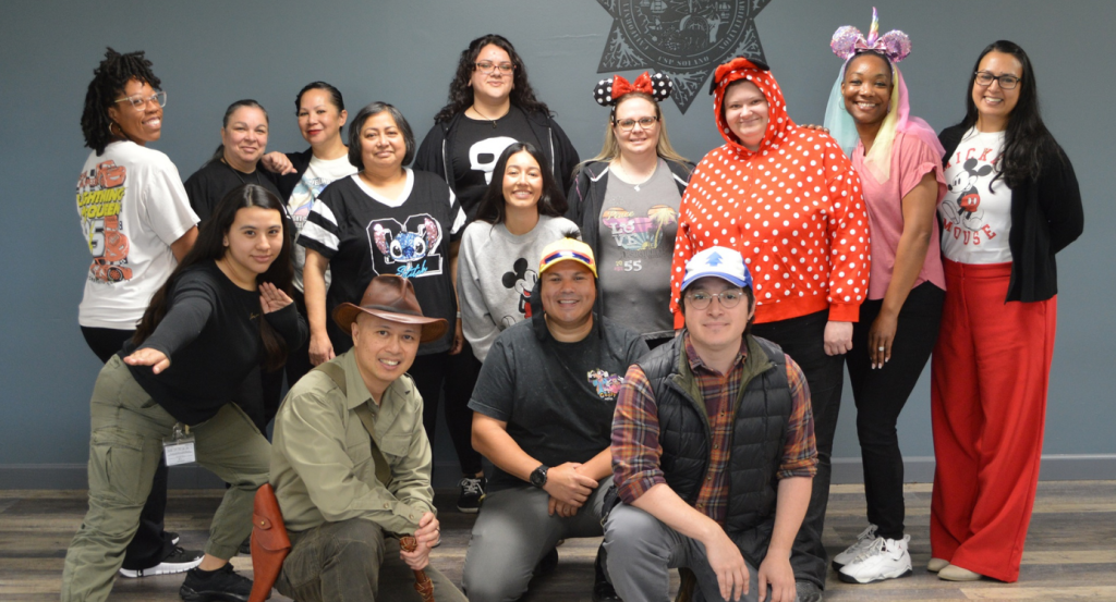 People wearing Disney shirts and hats at CSP-Solano.