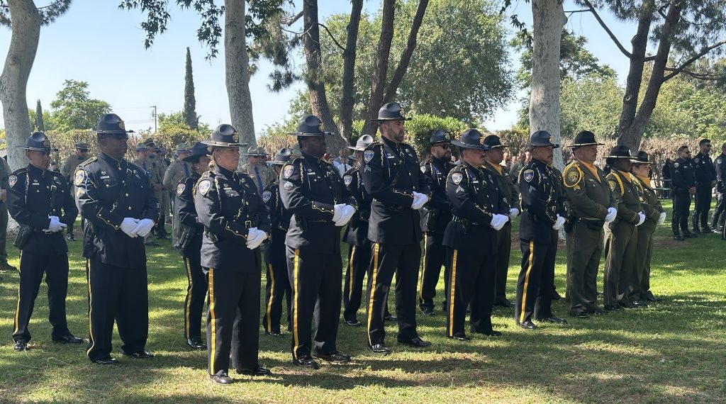 Group of law enforcement personnel from various agencies at the memorial ceremony in Bakersfield, Kern County, California, May 14, 2026.
