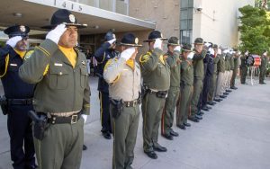 CDCR honor guard members and those from other agencies salute during the ceremony at Bakerfield in Kern County, California, May 14, 2026.