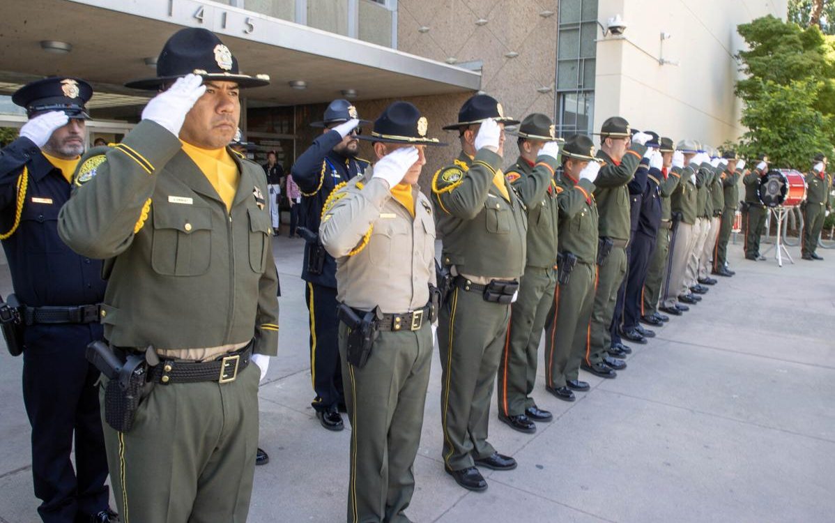 CDCR honor guard members and those from other agencies salute during the ceremony at Bakerfield in Kern County, California, May 14, 2026.
