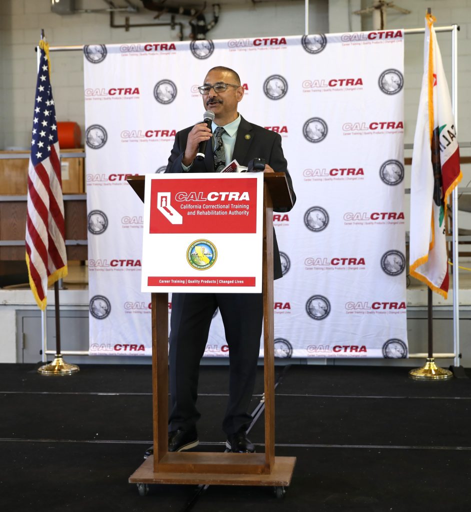 Andre Gonzales, acting warden at CSP-Solano, speaks during the graduation ceremony.
