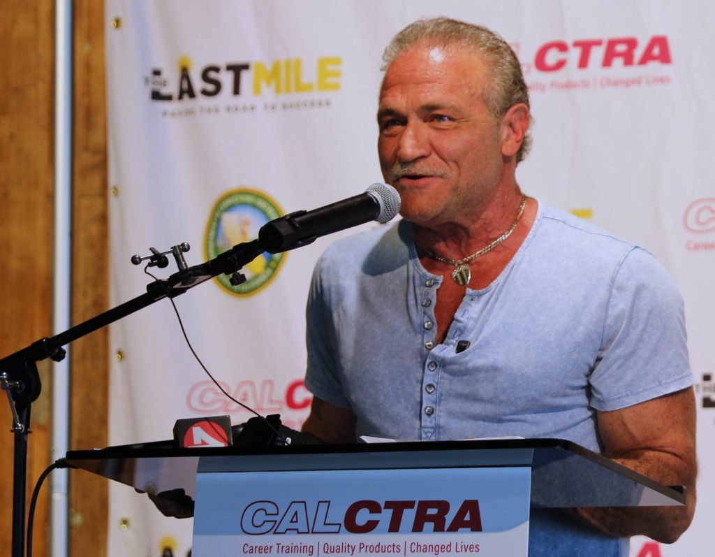 Dave Dahl, founder of Dave's Killer Bread, speaks at the San Quentin Rehabilitation Center's employer and community partner showcase, May 14, 2026.