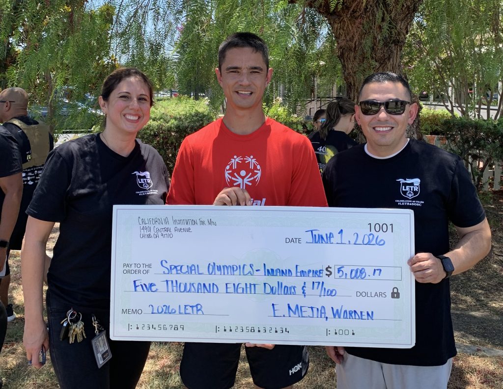 Check presented to Special Olympics from CIW and CIM.
