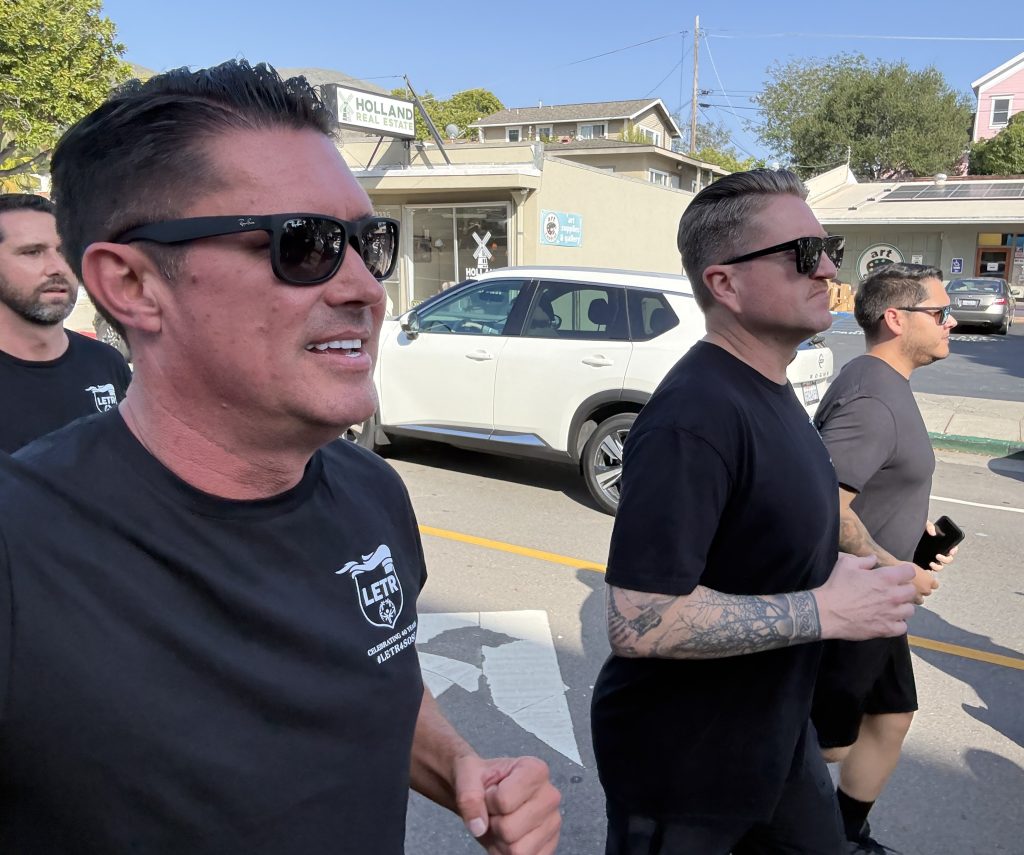 A group runs through an area of town for the LETR.