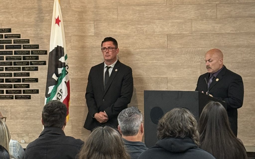 Prison leadership speaking at the CMC Memorial Wall ceremony, May 29, 2026.