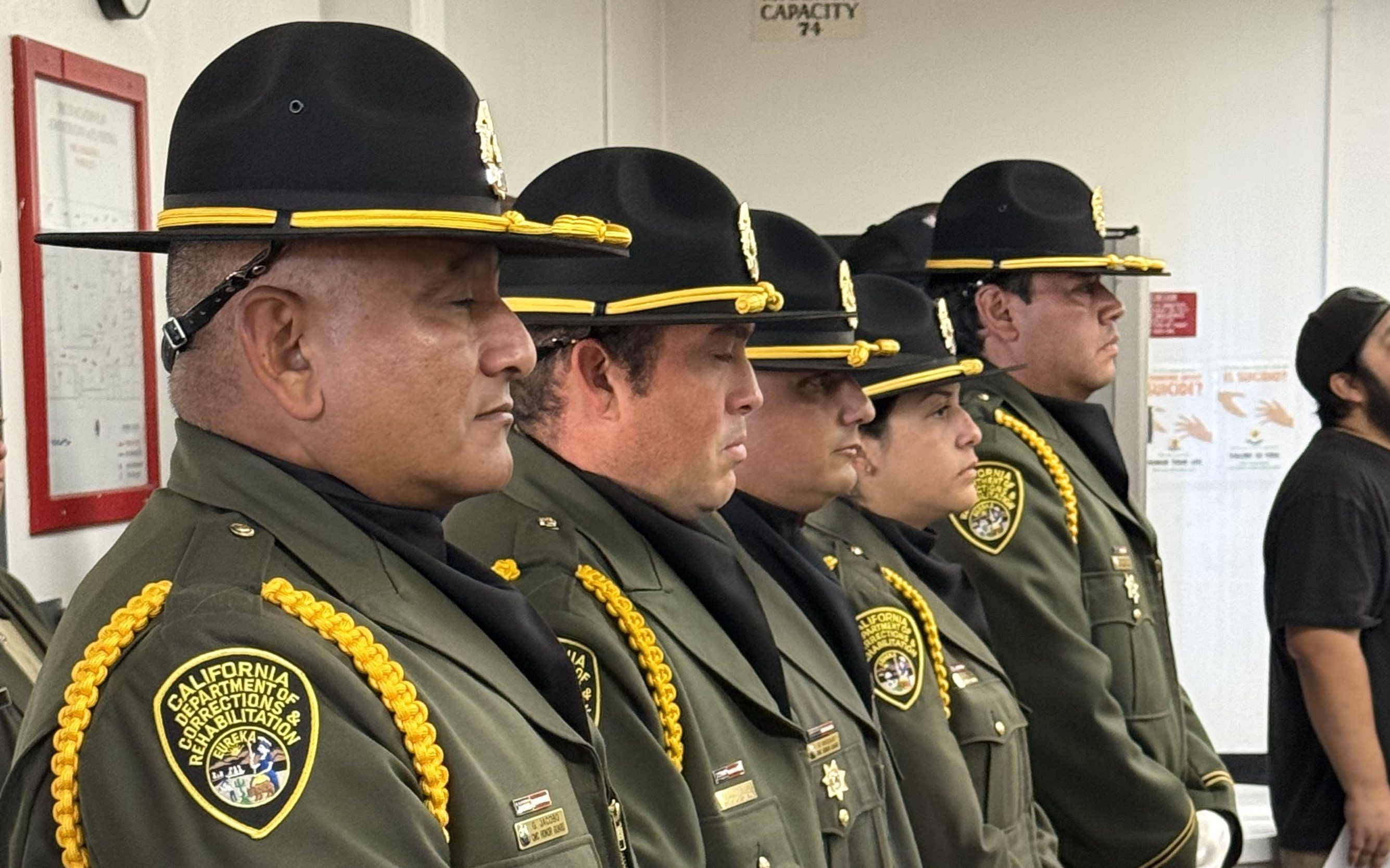 California Men's Colony Honor Guard members stand in a line at the Memorial Wall ceremony, May 29, 2026, San Luis Obispo, California.
