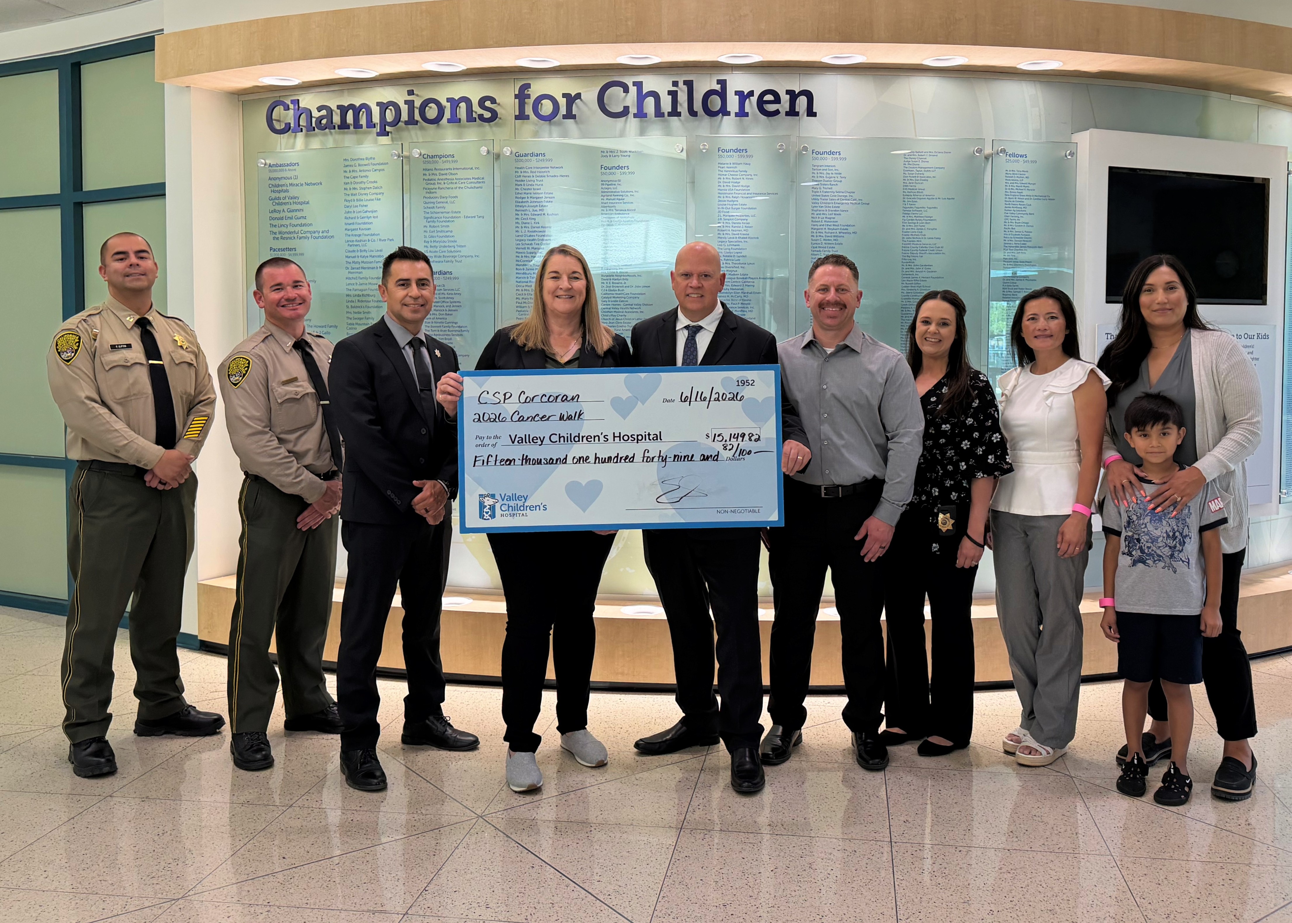 California State Prison Corcoran employees and executives present check to Valley Children’s Hospital