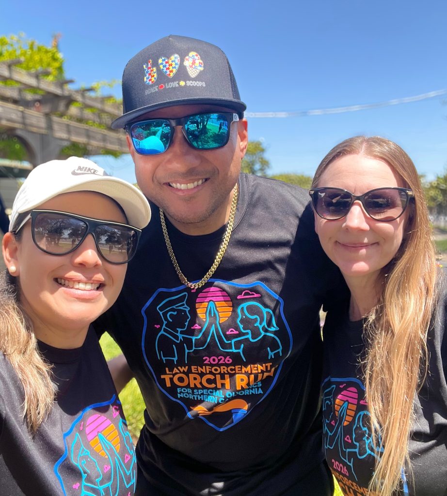 CTF and SVSP staff smiling at the Law Enforcement Torch Run in Monterey County.