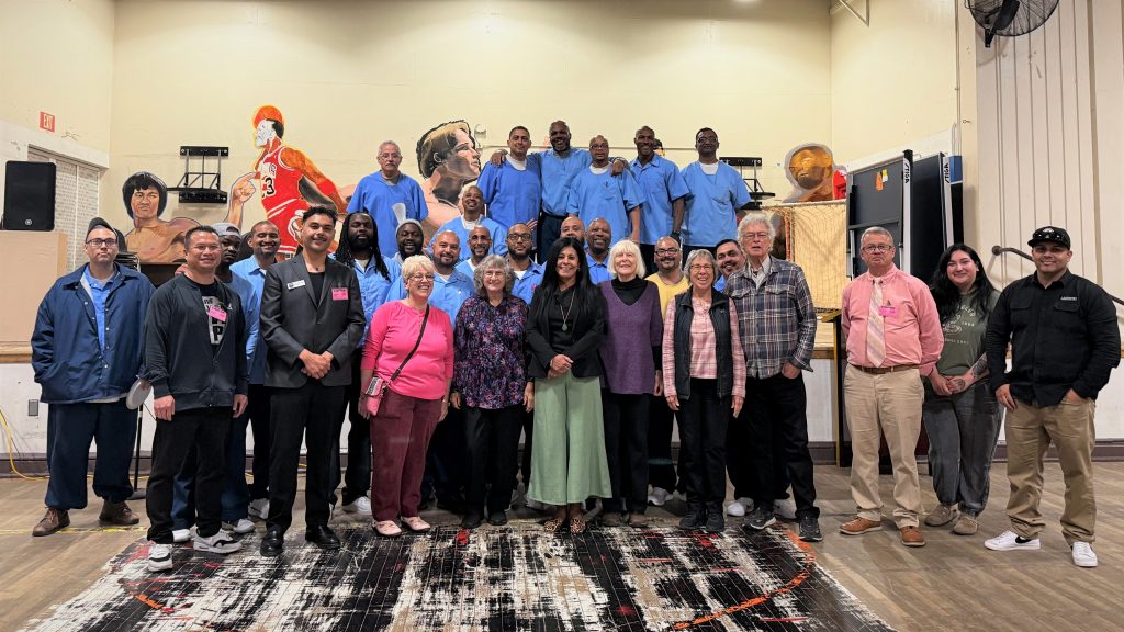CTF participants and partners in the central gymnasium honor Alternative to Violence Project