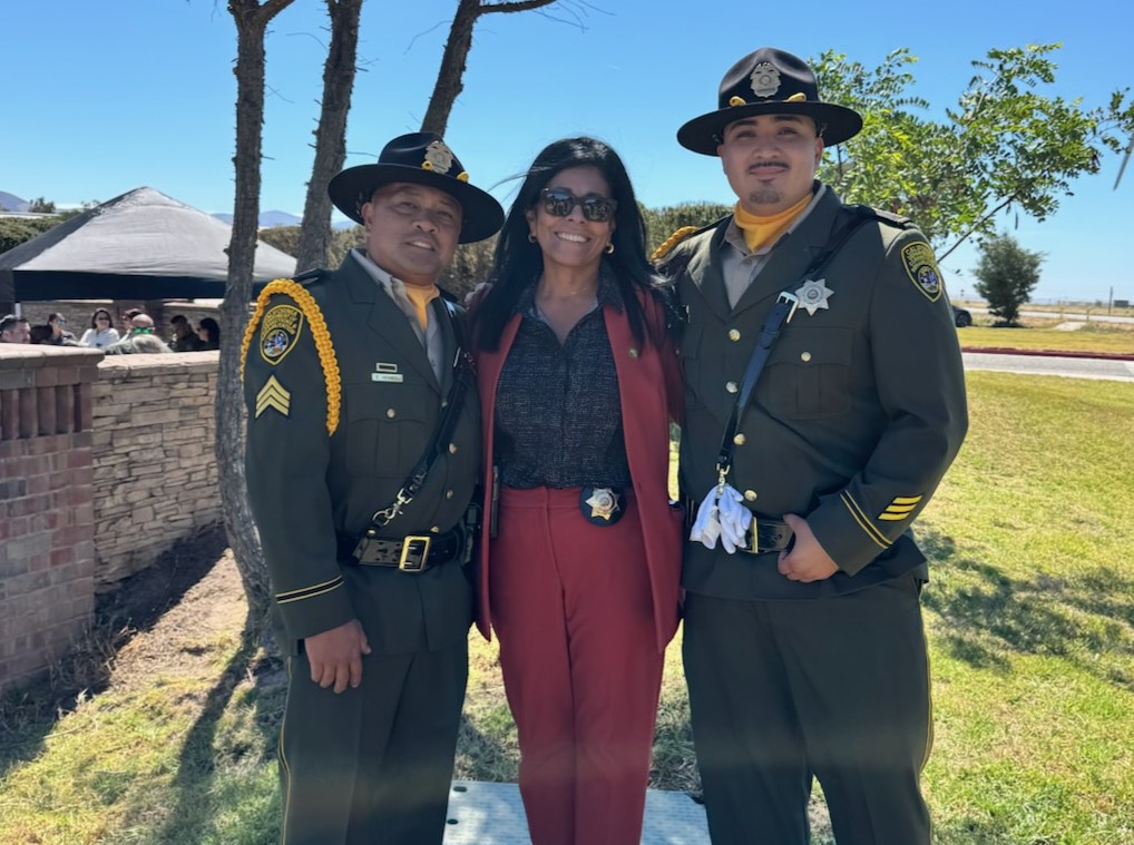 Acting Warden Rojas with two members of the CTF Honor Guard.