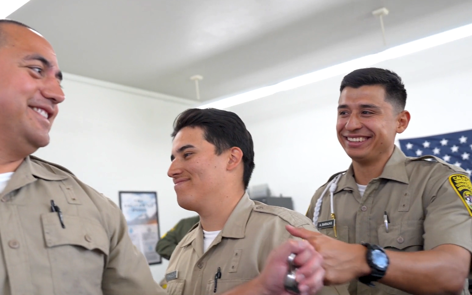 Cadet Barajas and others smiling at the Basic Correctional Officer Academy.