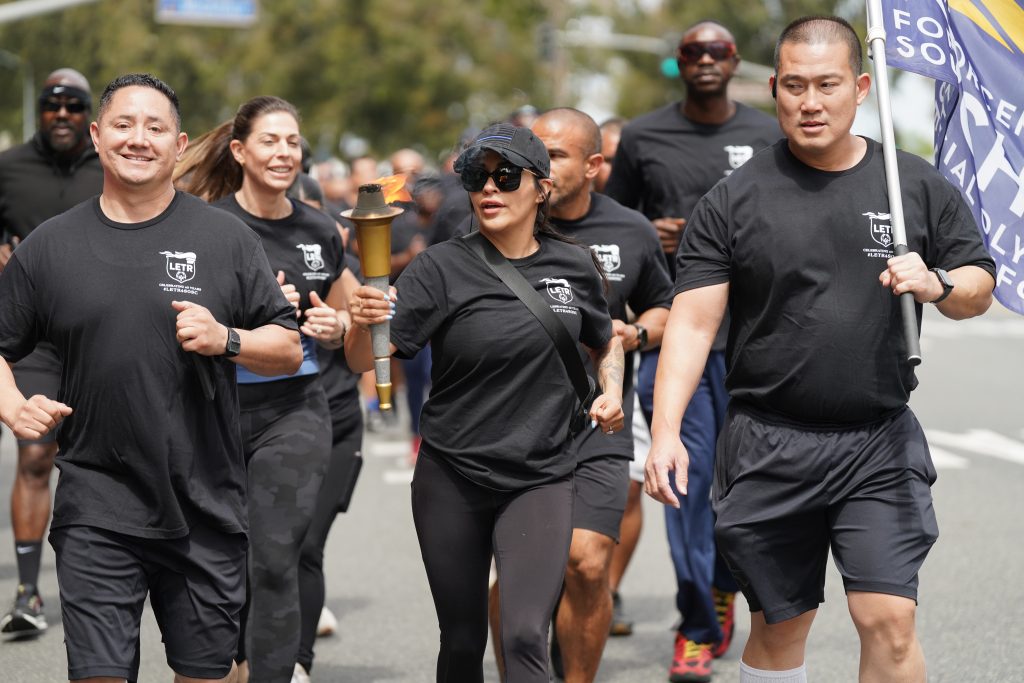 Runners carrying the torch for DAPO.