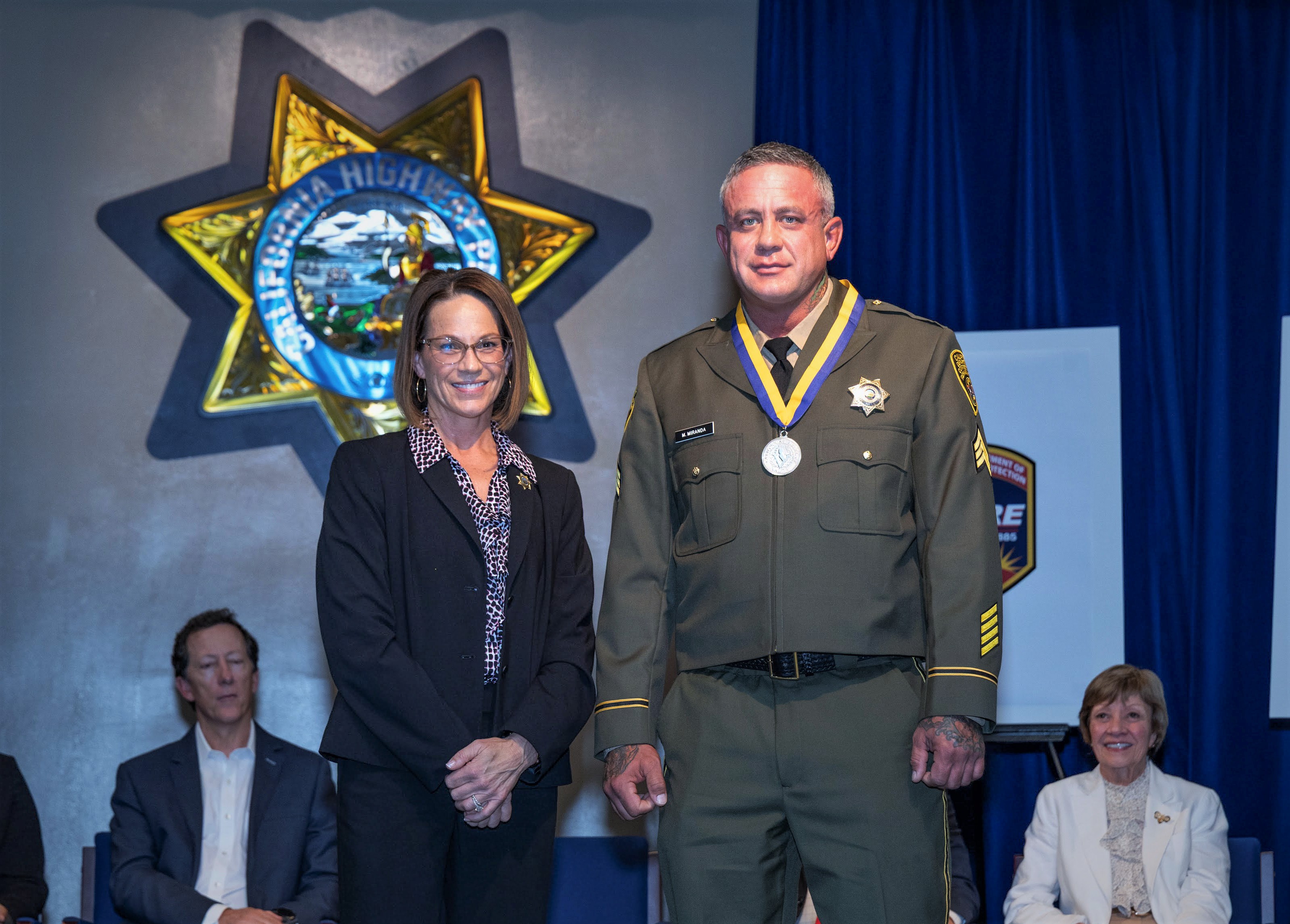 Correctional Officer Michael Miranda receiving a Silver Star Medal of Valor