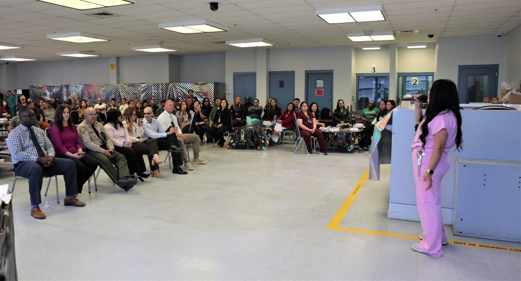 A staff member performs during the Kern Valley State Prison Talent Show.