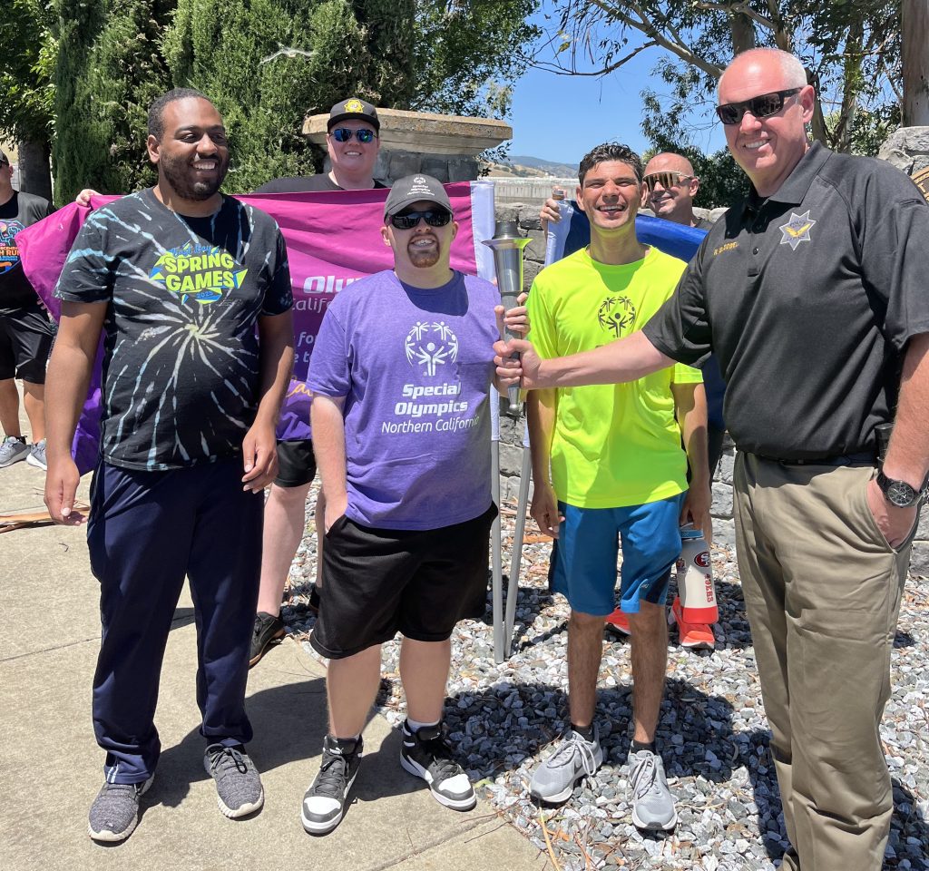 CSP-Solano staff with the Flame of Hope.