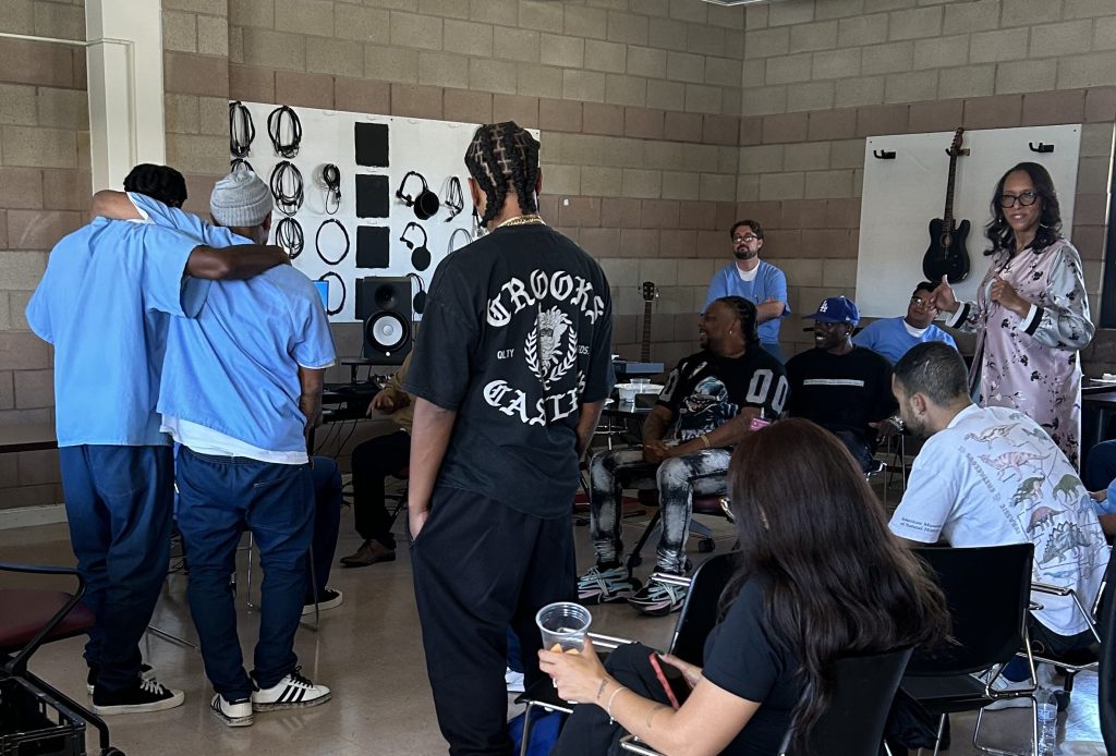 Participants work with producers and editors to create music at Valley State Prison in Chowchilla.