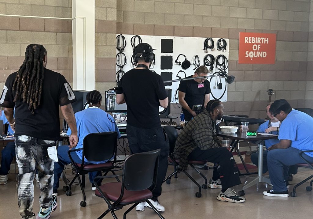 Participants work with producers and editors to create music at Valley State Prison in Chowchilla with Rebirth of Sound.