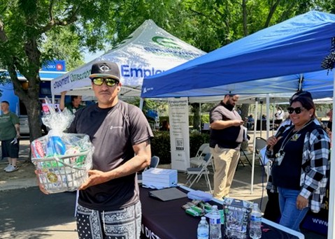 CRU hosted reentry fair prize package and recipient