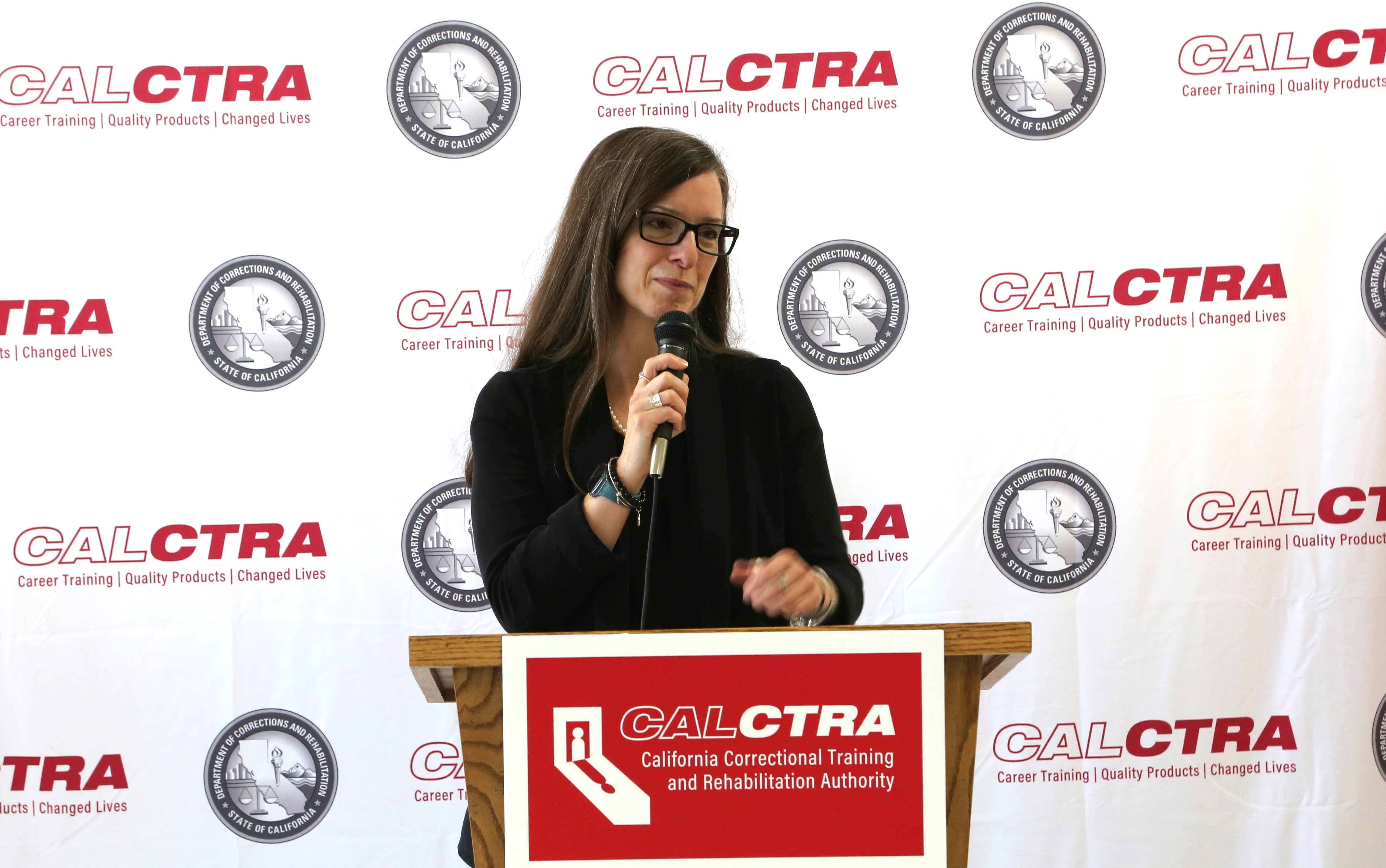Suzie Changus speaks at the Centinela graduation for CALCTRA.