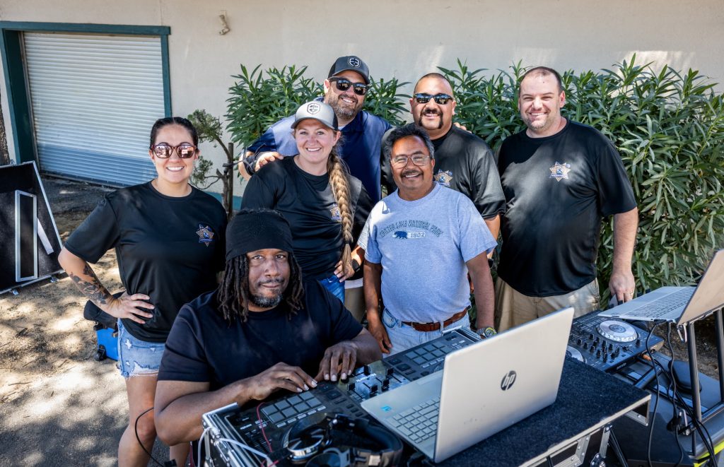 Solano Fallen Resource Fund board members pose with DJs John King and Rozelle Joyner during the annual Solano Fallen Resource Fund Softball Tournament.