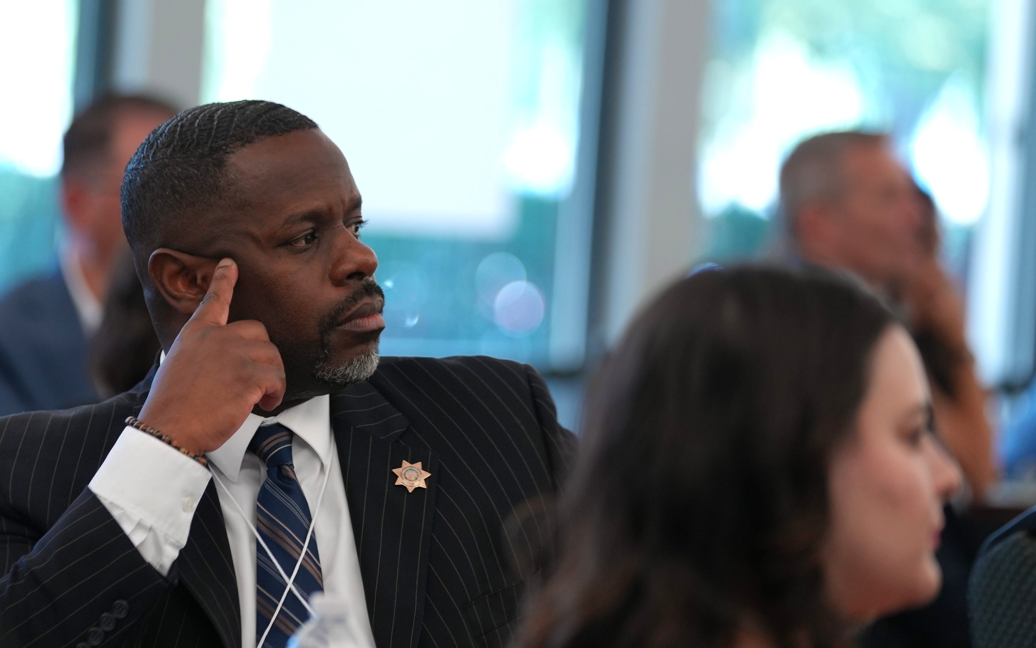 CDCR Undersecretary Jason Johnson listens during the Board of State and Community Corrections Adult Reentry Grants summit with community partners.