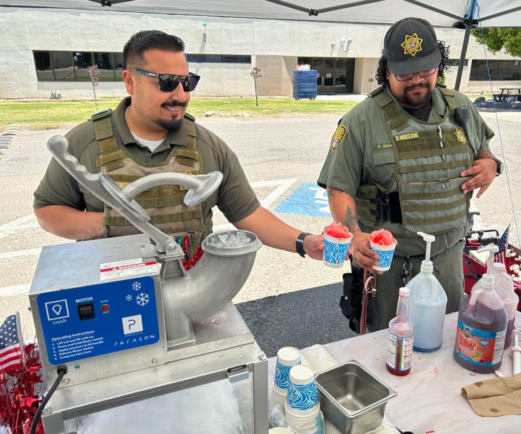 Employees make snow cones during staff appreciation day at Avenal State Prison, July 2, 2026.