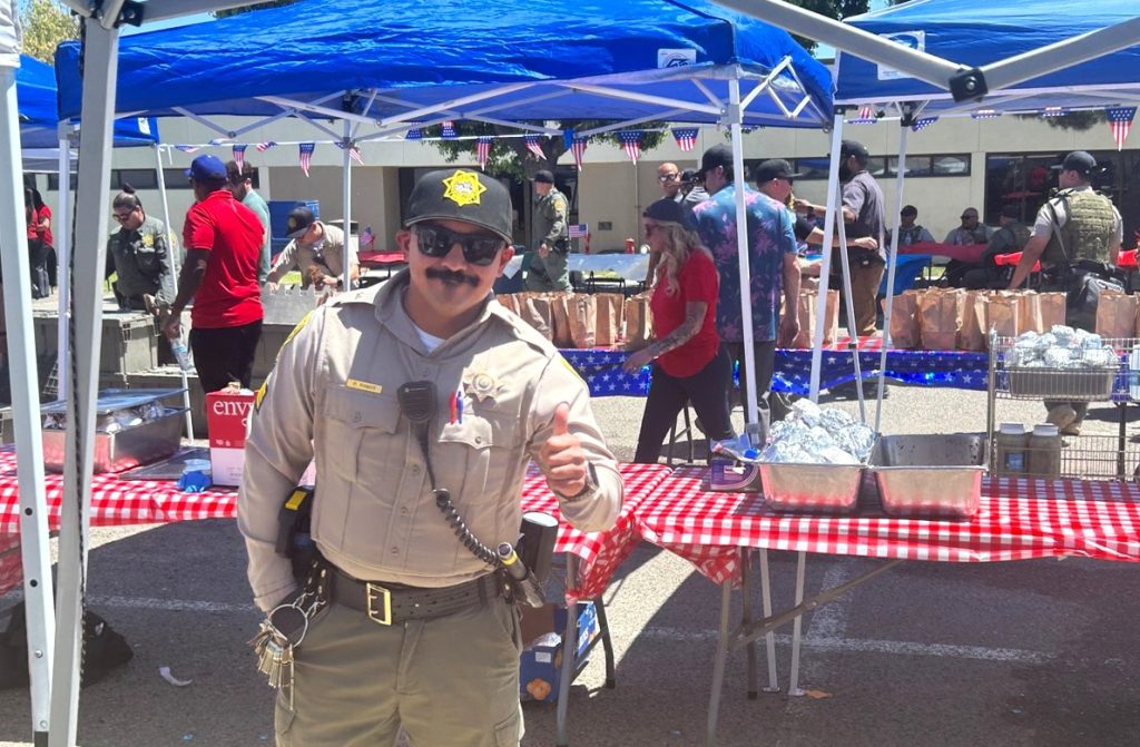 Thumbs up from a correctional officer at Avenal State Prison.