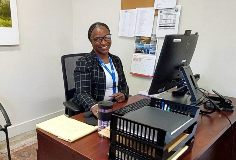 Cassandra Hamm at her desk.