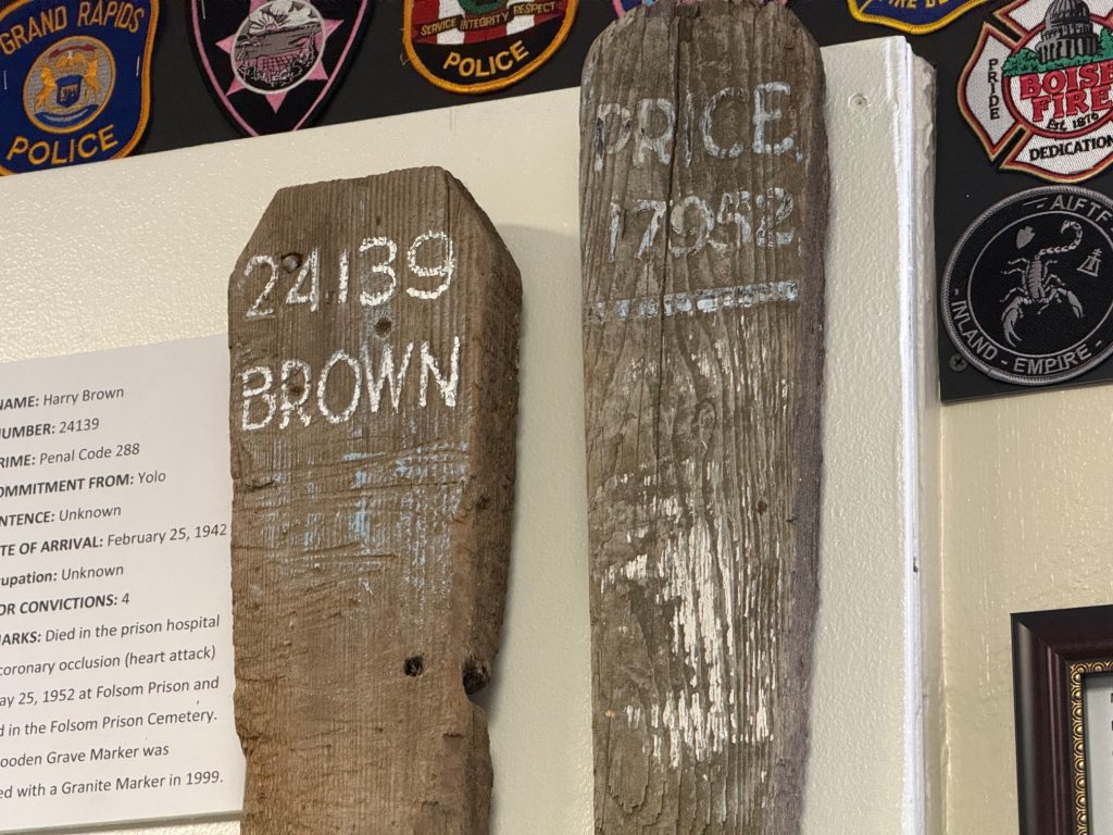 Two wooden grave markers, since replaced by granite markers at displayed at the museum.