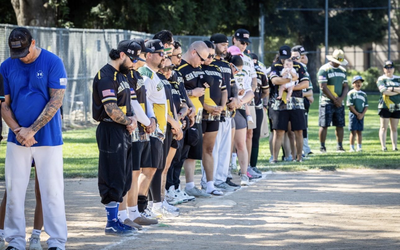 Teams representing San Quentin Rehabilitation Center pay their respects during the opening ceremony honoring fallen correctional professionals.