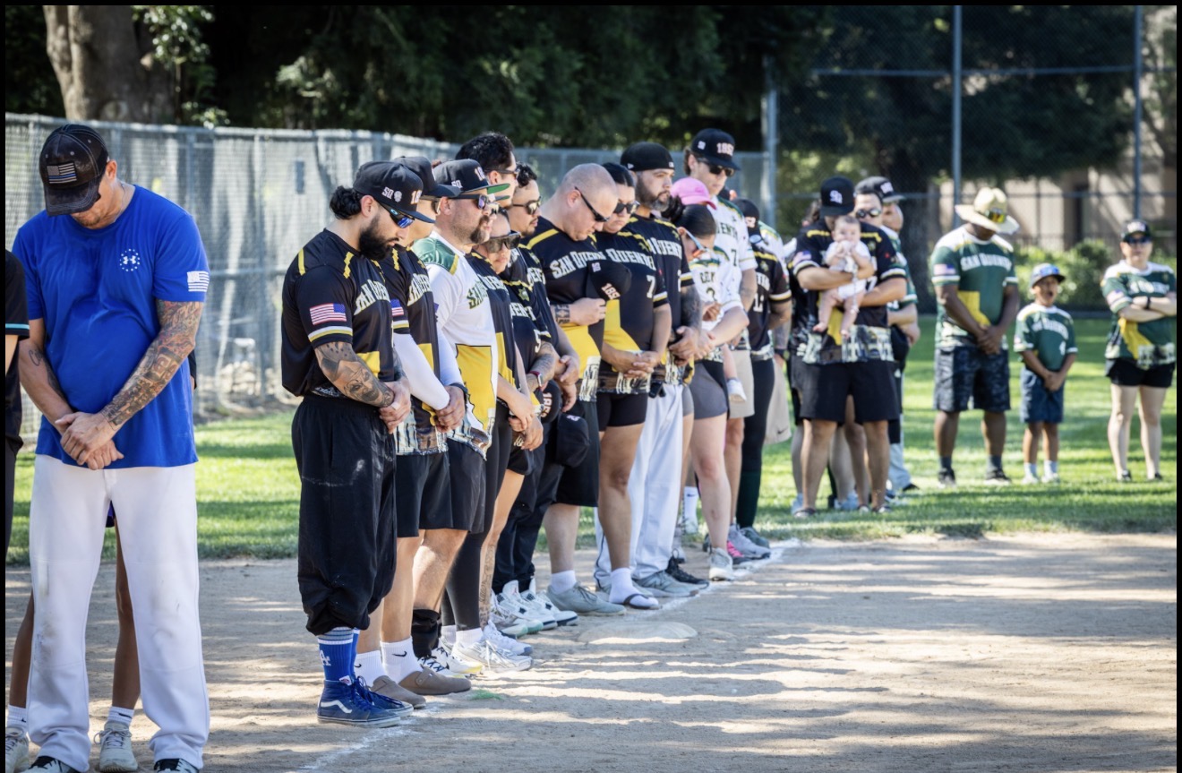 Teams representing San Quentin Rehabilitation Center pay their respects during the opening ceremony honoring fallen correctional professionals.