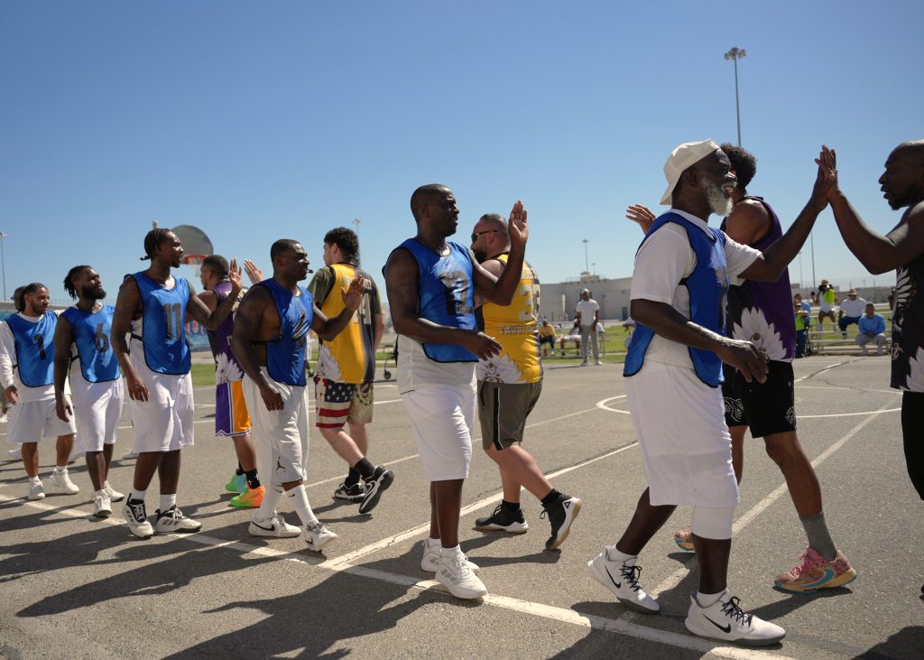 Good game high fives with SATF basketball event participants