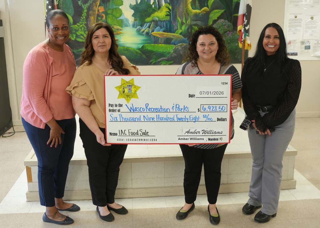 Wasco State Prison–Reception Center presented a check totaling $6,928 to the Wasco Parks and Recreation District on July 1.